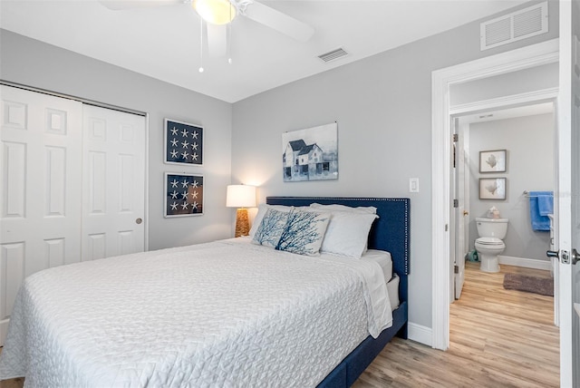 bedroom with wood-type flooring, a closet, and ceiling fan