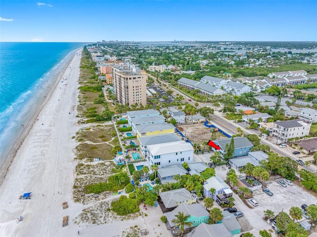 bird's eye view with a view of the beach and a water view