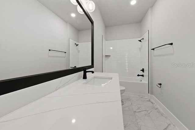 full bathroom featuring tiled shower / bath combo, vanity, and toilet