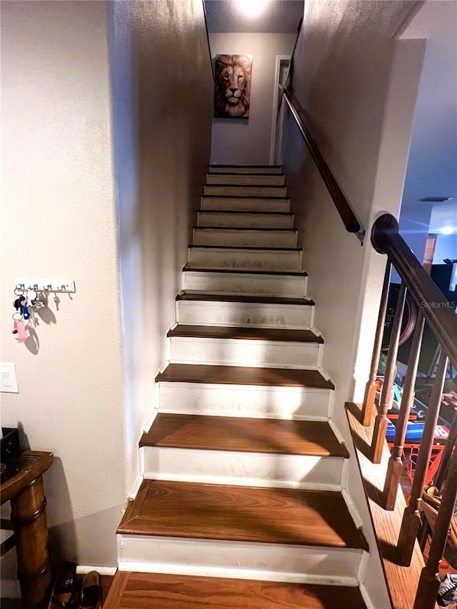 staircase with baseboards