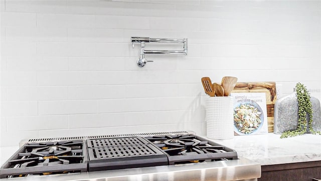 interior space with stove and stainless steel gas stovetop