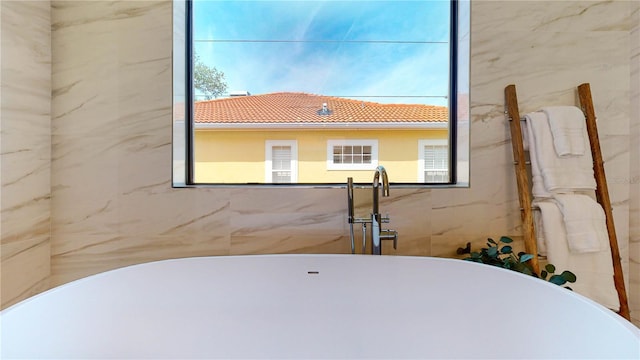 interior space featuring a bathtub