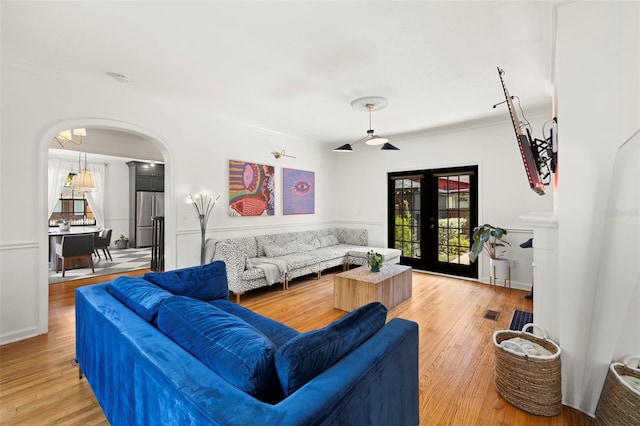 living room featuring french doors and wood-type flooring