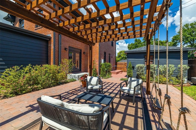 view of patio / terrace featuring an outdoor hangout area and a pergola