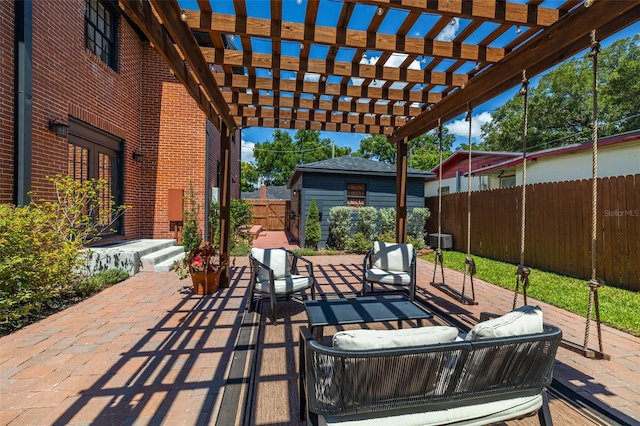 view of patio with a pergola and an outdoor hangout area