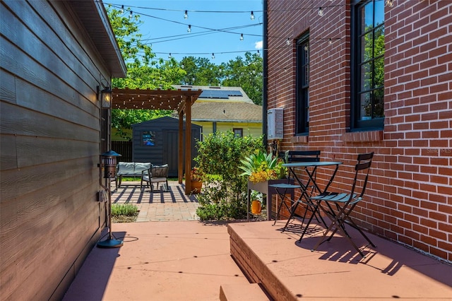 deck featuring a pergola and a patio