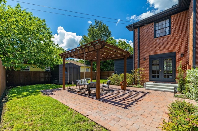 view of patio / terrace featuring a shed, a pergola, and french doors