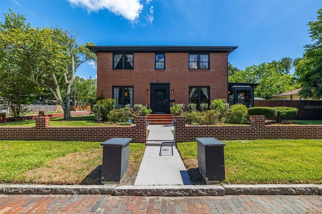 view of front facade with a front lawn