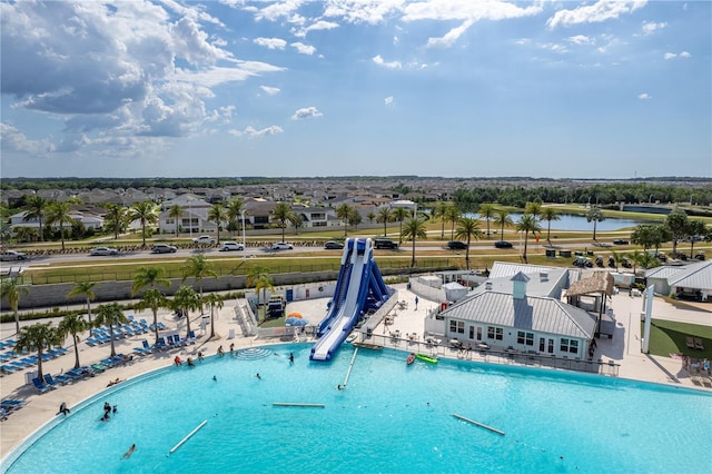 birds eye view of property featuring a water view