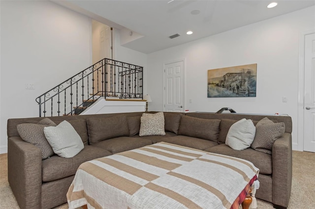 bedroom featuring light colored carpet