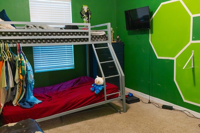 bedroom featuring multiple windows