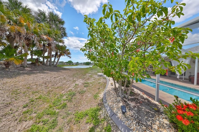 view of yard with a water view