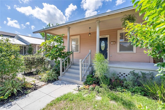 view of front of home featuring covered porch