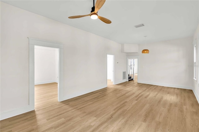 unfurnished room featuring ceiling fan and light wood-type flooring