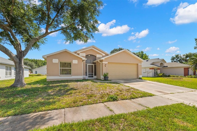 single story home featuring a garage and a front lawn