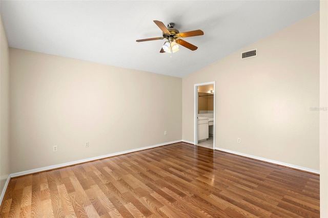 spare room featuring hardwood / wood-style flooring, ceiling fan, and lofted ceiling