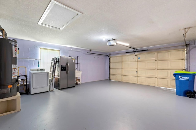 garage with gas water heater, a garage door opener, stainless steel refrigerator with ice dispenser, and washer / clothes dryer