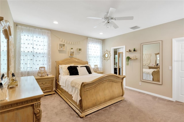 carpeted bedroom featuring ceiling fan