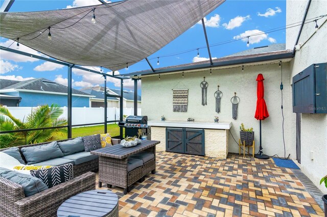 exterior space featuring an outdoor living space and a grill