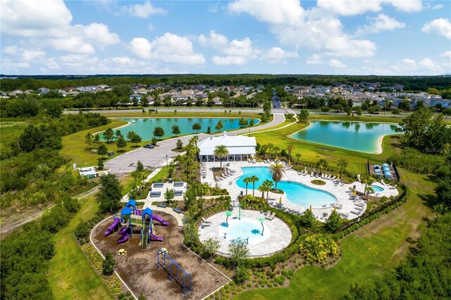 birds eye view of property featuring a water view