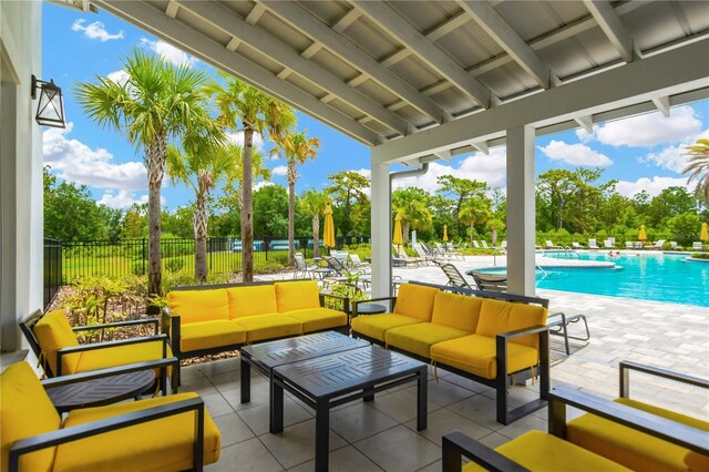 view of patio / terrace with a community pool and an outdoor hangout area