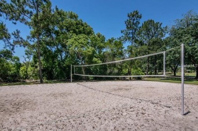 view of property's community featuring volleyball court