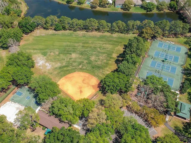 birds eye view of property with a water view