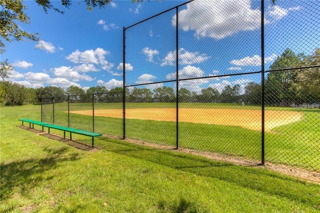 view of property's community with a yard