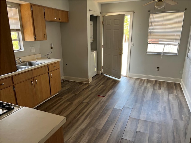 kitchen with plenty of natural light, dark wood-type flooring, and ceiling fan