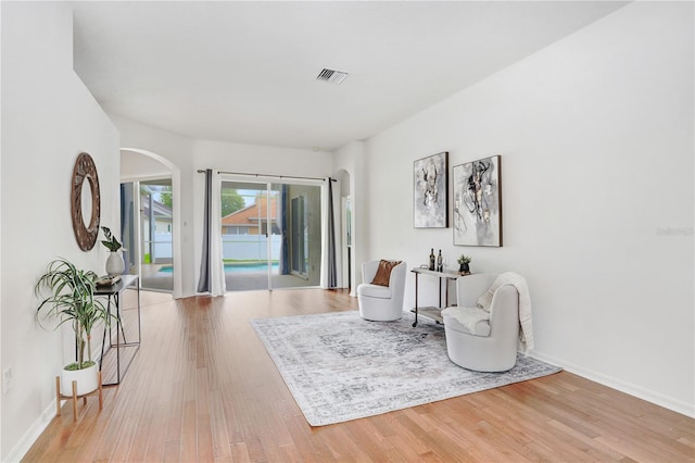 sitting room featuring light wood-type flooring