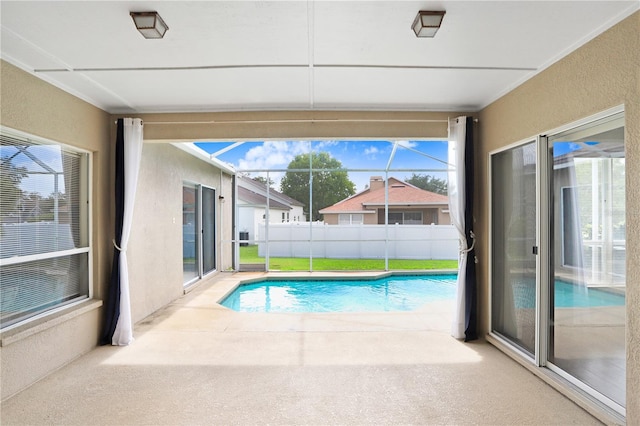 view of pool featuring a patio area and a lanai