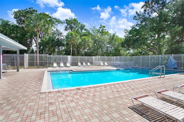 view of pool featuring a patio