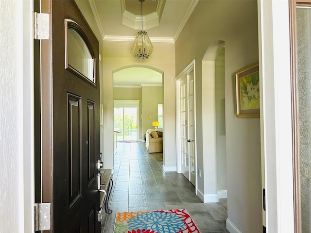 interior space featuring crown molding