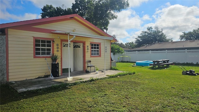 exterior space with a yard