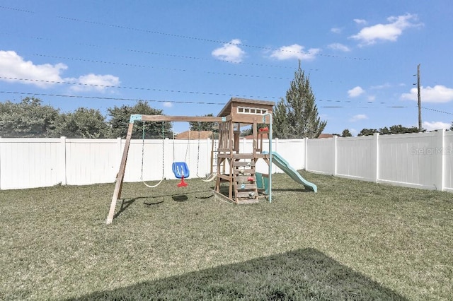 view of jungle gym featuring a yard