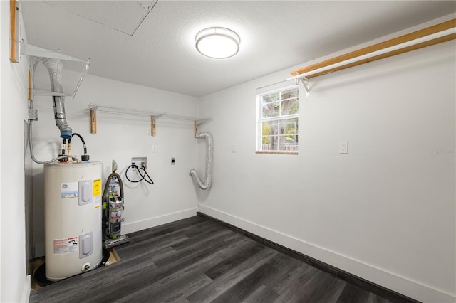 utility room featuring water heater