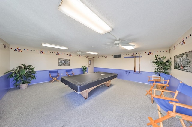 playroom with ceiling fan, pool table, carpet floors, and a textured ceiling