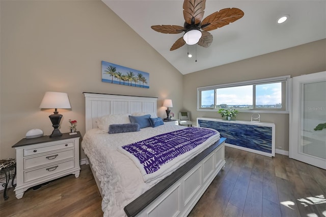 bedroom with high vaulted ceiling, dark hardwood / wood-style floors, and ceiling fan