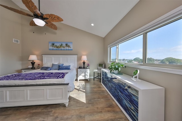 bedroom featuring vaulted ceiling, wood-type flooring, and ceiling fan