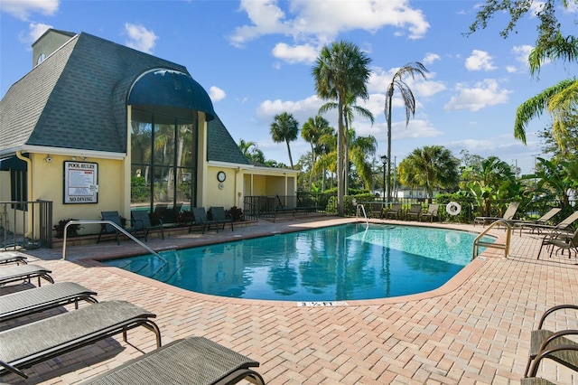 view of pool featuring a patio