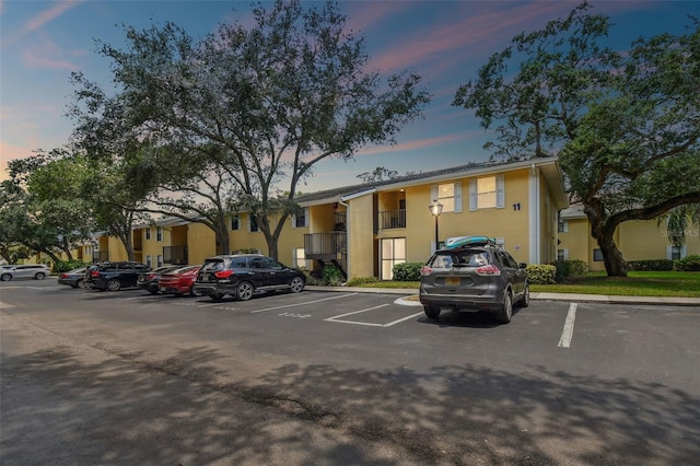 view of parking at dusk