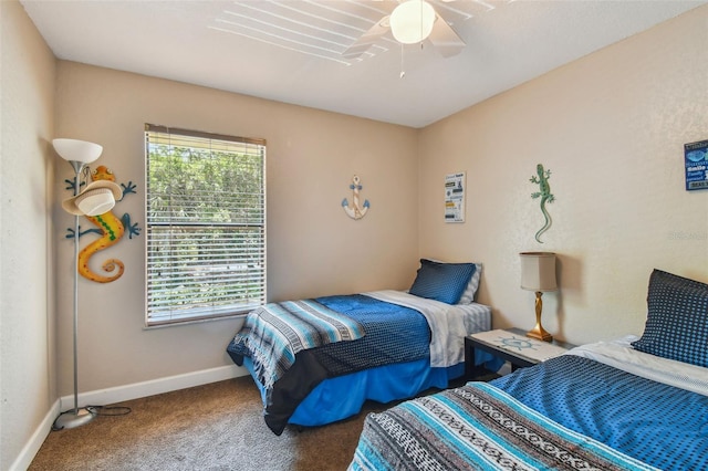 bedroom with ceiling fan and carpet