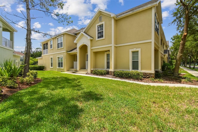 view of front facade with a front yard