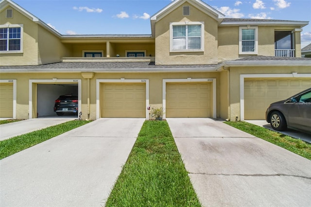 view of property featuring a garage