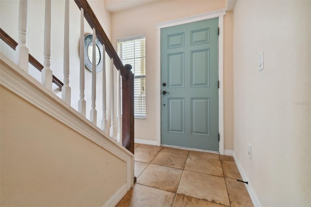 view of tiled foyer entrance