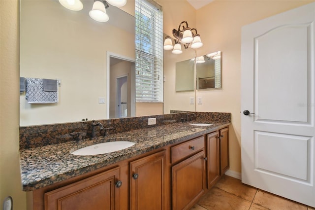 bathroom featuring tile patterned floors and vanity