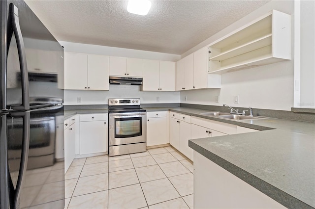 kitchen featuring stainless steel electric range oven, fridge, light tile floors, sink, and white cabinetry