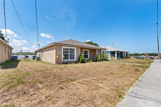 view of front of home with central AC unit