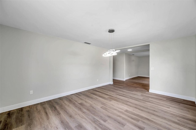 unfurnished dining area featuring light hardwood / wood-style floors