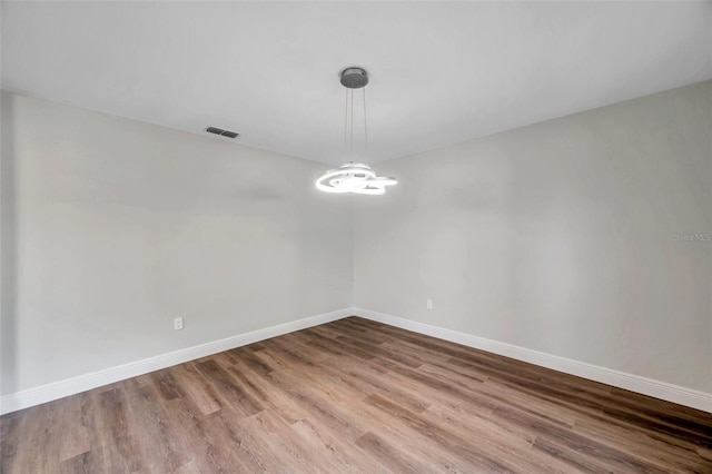 empty room featuring hardwood / wood-style floors